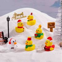 Vente en gros de Noël Canard en caoutchouc Jouet Chapeau de Père Noël Canard jaune Figurine Cadeau de fête personnalisé OEM et bas de Noël