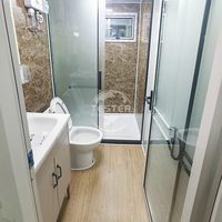 Nouveau produit 2025 Maison préfabriquée extensible de luxe en conteneur de 20 pieds et 40 pieds, panneaux sandwich, construction en acier, bâtiment de bureaux
