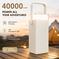 Batterie externe grande capacité 2026 avec éclairage d'ambiance, chargeur portable multi-sorties pour camping et voyage, 40000 mAh