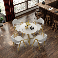 Ensemble de table à manger moderne en MDF avec 4 chaises pour salle à manger, hôtel, restaurant, café, boutique, usage de loisirs et de réception