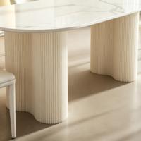 Ensemble de table et chaises de salle à manger ovales en pierre frittée blanc crème de luxe, design cannelé, pour villa, hôtel, restaurant