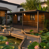 Expédition immédiate : Maison conteneur extensible de 40 pieds avec terrasse couverte, structure noire, 2 chambres, pour camping et complexe hôtelier