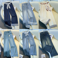 Jean vintage délavé taille haute à jambe large pour femme, en denim doux et respirant, style streetwear décontracté, commande en gros
