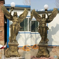 Bronze fonte paire de nus garçons statue antique sculpture lampadaire à vendre