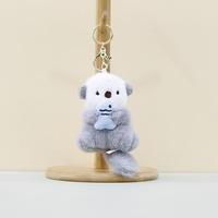 Nouveau adorable porte-clés en peluche loutre, jouet en peluche de dessin animé, mini loutre en peluche douce et mignonne, porte-clés, décoration de sac