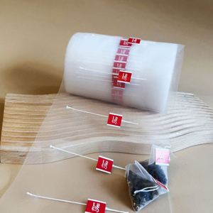 Rouleau de matériau en nylon pour sachets de thé avec ficelle et étiquette pour machine à ensacher le thé automatique, qualité alimentaire, logo personnalisé - Product Image 1