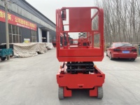 Piattaforma a forbice elettrica semovente in acciaio al manganese da 500 kg con velocità di sollevamento di 3-5 m/min per lavori di gestione delle strutture