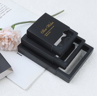 Boîte cadeau de bijoux de bague de collier de film PE noir de logo personnalisé promotionnel