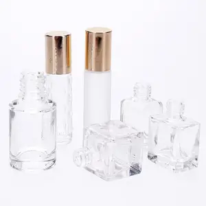 Vista Precio de fábrica Esmalte de uñas pequeño 10ml 30ml 50ml Perfume Forma redonda Botella de vidrio de forma cuadrada Forma especial con tapa de cepillo