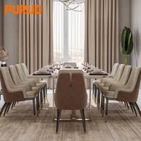 Table à manger ovale Puruo Light Luxury avec plateau asymétrique sur une base de table à manger à 3 pieds en or massif