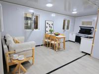 Expédition immédiate : Maison conteneur préfabriquée de luxe extensible 40 pieds/20 pieds, 2 chambres, moderne, blanche, mobile, résistante aux ouragans, pour école, centre commercial, habitation
