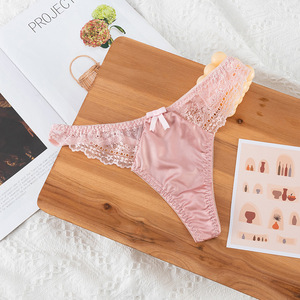 Tangas de satén de lujo al por mayor para mujer, ropa interior cómoda de talle bajo con lazo decorativo, lencería sexy para damas - Product Image 1