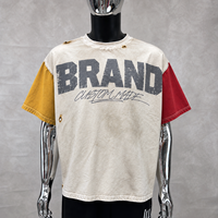 T-shirt personnalisé vintage avec impression DTG, coupe ample et épaisse, effet déchiré, délavé à l'acide, color block