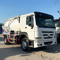 Camion d'aspiration des eaux usées Sinotruk 4x2 10CBM avec pompe à vide et réservoir de 10000L, occasion
