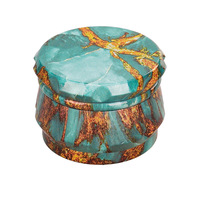 Vente en gros de broyeur d'herbes sèches à 4 couches Accessoires pour fumeurs personnalisés Broyeur manuel en métal de 63mm avec logo personnalisé OEM