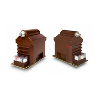 Les dispositifs de mesure et de protection utilisent un transformateur de tension monophasé de classe 12 kV JDZX10-10R pour les applications en systèmes moyenne tension.