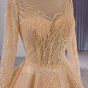 ชุดราตรีทรงบอลกาวน์แขนยาวสีทองหรูหรา รุ่น 251007 สำหรับชาวมุสลิม ยาวกรอมพื้น แต่งระบายจีบแบบธรรมชาติ - Product Image 4