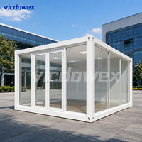 VICDOWEX - Showroom en conteneur préfabriqué - Mur-rideau en verre - Design contemporain - Modulaire - Préfabriqué - Pour immeuble de bureaux - Entrepôt