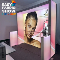 Promotion : Stand d'exposition modulaire lumineux en tissu SEG rétroéclairé 10x10 personnalisé pour événements promotionnels et fêtes