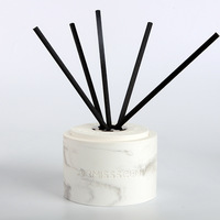 Vente en gros de roseau aromatique béton plâtre peinture chinoise diffuseur rond logo personnalisé boîte cadeau unique bouteille diffuseurs de roseaux