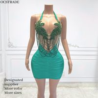Ocstrade Robes de club sans manches dos nu design de mode Mini robes de club sexy avec chaînes en strass et paillettes pour femmes