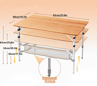 Table de camp en aluminium légère et portable à hauteur réglable pliante à quatre volets pour les voyages en plein air, le dîner et le camping.