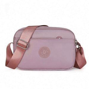 Sac à bandoulière pour femme en nylon Oxford imperméable, sac minimaliste à porter en bandoulière, sac de poitrine pour femme, vente chaude - Product Image 1