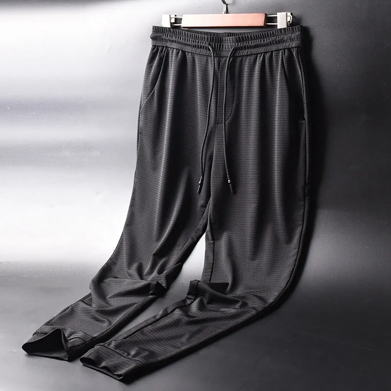 Summer large size Thin Ice Silk casual pants men's loose quick-drying all-Match sports pants youth Korean style cropped pants