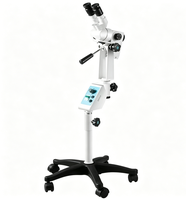 Colposcope vétérinaire binoculaire sur support roulant pour l'examen clinique du tractus reproducteur des animaux de grande et petite taille