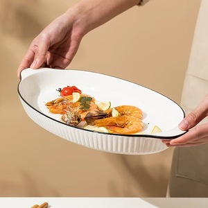 Plat de cuisson moderne <span class=keywords><strong>en</strong></span> céramique blanche avec doubles poignées et bord noir, plat ovale <span class=keywords><strong>en</strong></span> <span class=keywords><strong>porcelaine</strong></span> pour poisson, pâtes, salade, hôtel, restaurant - Product Image 4