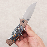 Vente directe d'usine de couteaux tactiques de camping et de chasse en plein air. Style pliable.