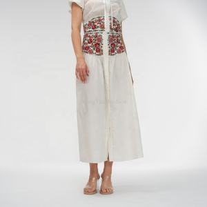 ผู้ผลิต OEM รับออกแบบกระโปรงยาวผ้าฝ้ายสำหรับผู้หญิง กระโปรงแม็กซี่ปักลายดอกไม้ติดกระดุม - Product Image 1