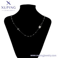 Collier pendentif croix religieuse perlée noir et argenté XUPING T001306088 – Chaîne tendance pour femme, idéal pour les soirées décontractées