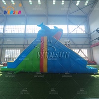 Château gonflable aquatique WINSUN en forme de dauphin avec double toboggan et parcours d'escalade bleu
