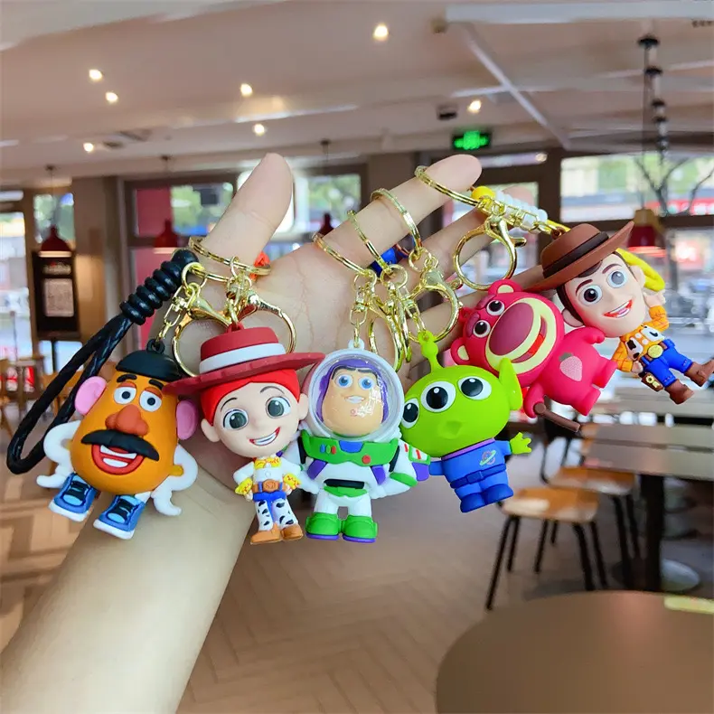 Nuevo 3D muñeca colgante llaveros encantadores dibujos animados ToyStory Buzz Light year Woody llavero Anti-Pérdida coche llave bolsa accesorios llavero