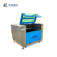 Machine de découpe de gravure Laser CO2 à refroidissement par eau haute sécurité 90W/100W pour bouteille en verre MDF en bois de noix de coco avec plate-forme montante
