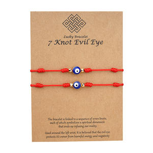 Encanto de moda 2 unids/set Lucky <span class=keywords><strong>7</strong></span> <span class=keywords><strong>nudos</strong></span> mal de ojos <span class=keywords><strong>pulsera</strong></span> para Mujeres Hombres niños cuerda roja ajustable trenzada TARJETA DE PAPEL DE MODA Brace - Product Image 2