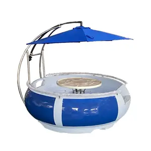 Barca a ciambella ricreativa panoramica con griglia per barbecue da tavolo e parasole