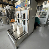 Machine de remplissage semi-automatique de haute qualité pour engrais liquides en vases en verre, anti-corrosion, avec une capacité de 1 à 30 L et une haute précision