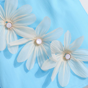 ชุดเสื้อผ้าสองชิ้นสำหรับเด็กผู้หญิง เนื้อผ้านุ่ม ระบายอากาศได้ดี เหมาะสำหรับฤดูร้อน มาพร้อมเสื้อท่อนบนดีไซน์สวยและกางเกงขาสั้นลำลอง - Product Image 5