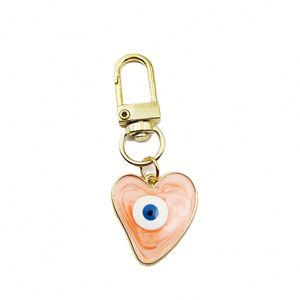 Llavero de lujo de aleación de zinc con diseño de gota de agua, corazón, ojo turco y brújula, esmaltado con ojo azul, resistente al agua, para amistad, pareja, bolso, coche y teléfono - Product Image 4