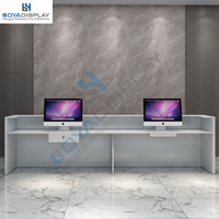Vente en gros logo personnalisé taille pas cher prix d'usine meubles luxe argent beauté vente en forme de L table de réception bureau à vendre