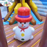 Parc de jeux gonflable de Noël en forme de cabane d'hiver, maison de jeu gonflable à thème de Noël pour enfants avec toboggan pour fêtes et divertissements