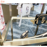 Kiosque à vêtements en acier inoxydable, présentoirs de vêtements personnalisés, présentoirs de boutique de robes pour femmes, meubles de vitrine