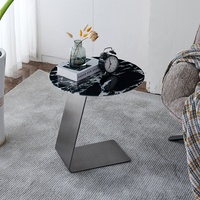 Canapé d'angle moderne italien minimaliste et circulaire Selle en cuir Bord en acier inoxydable Designer Balcon Petite table basse