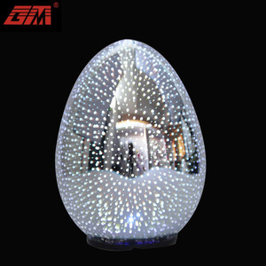Huevo de Pascua Decorativo 2026 con Iluminación LED a Pilas, Huevo de Cristal Iridiscente sobre Pedestal - Product Image 1