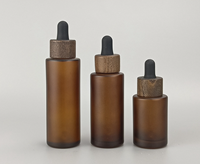 Flacon compte-gouttes en verre ambré transparent givré de 30 ml, 50 ml, 60 ml avec bouchon compte-gouttes en bambou pour emballage de soins de la peau