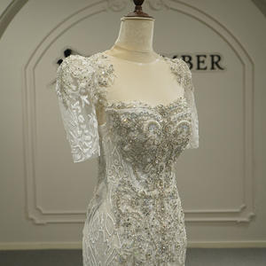 Robe de mariée moderne haut de gamme Gt26047, nouvelle collection, en dentelle artisanale, dos nu, amincissante, ornée de perles, avec traîne chapelle. - Product Image 3