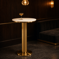 Table de bar ronde avec plateau en pierre frittée, base en acier cannelé doré, table haute de cocktail, fabrication OEM