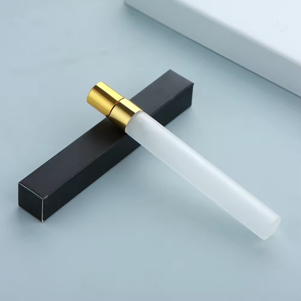 bouteille givrée + pulvérisateur doré + boîte noire